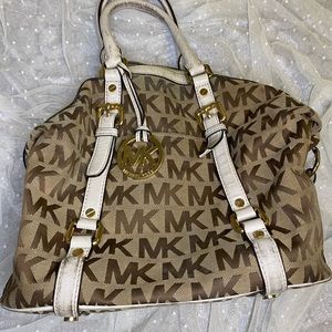 Authentic Michael Kors Hand Bag with Adjustable Sides and Large Moniker Charm